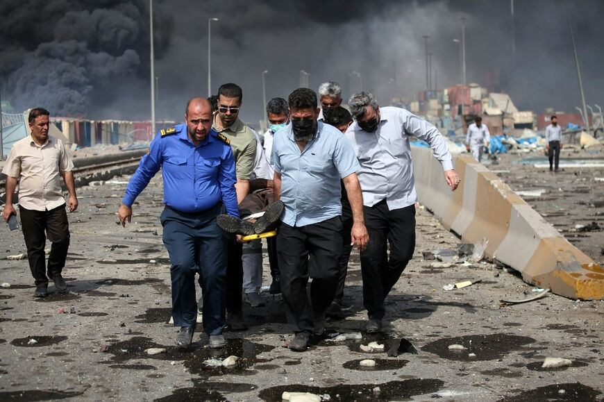 At least 14 dead and over 750 injured after a fire breaks out at a port in southern Iran.